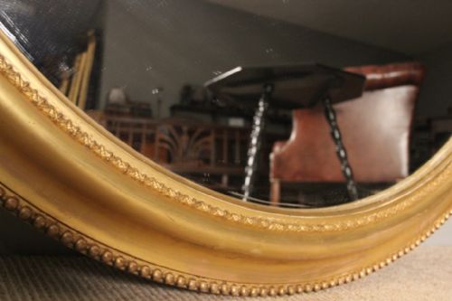 fig 5. A Pair of Giltwood Oval Mirrors
