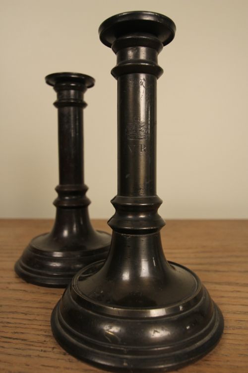 A Stylish Pair of Lacquered Candlesticks