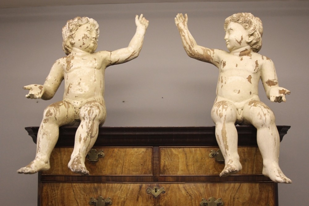 A Pair of 19th Century Carved Cherubs