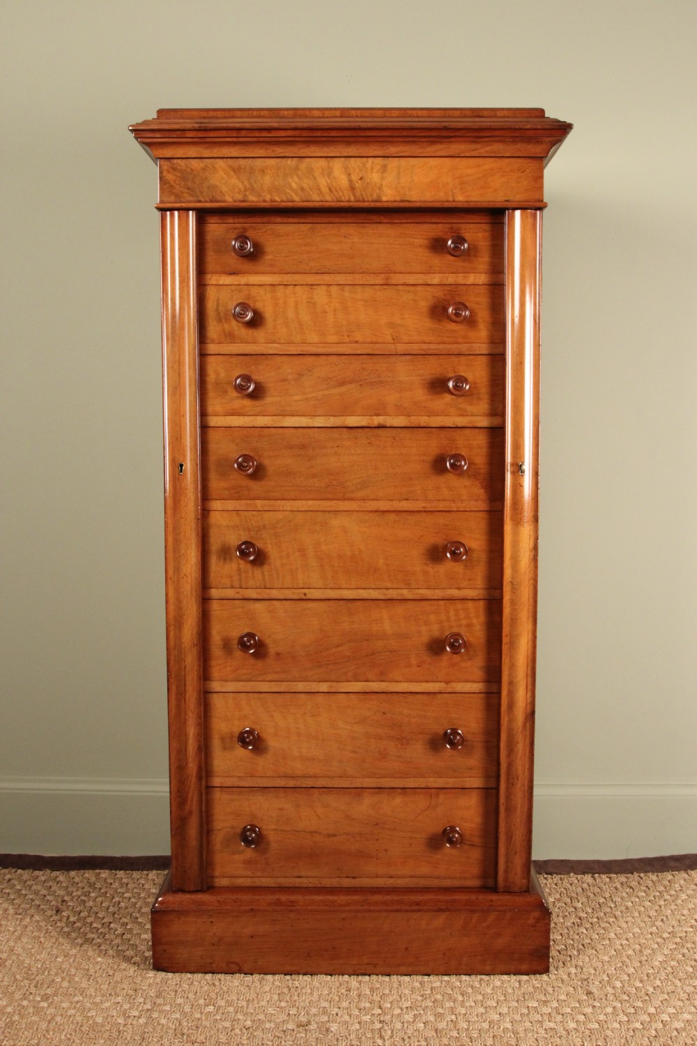 A Superb Figured Walnut Wellington Chest