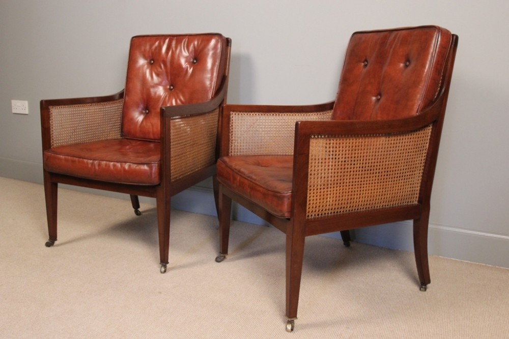A Superb Pair of Leather Bergere Library Chairs