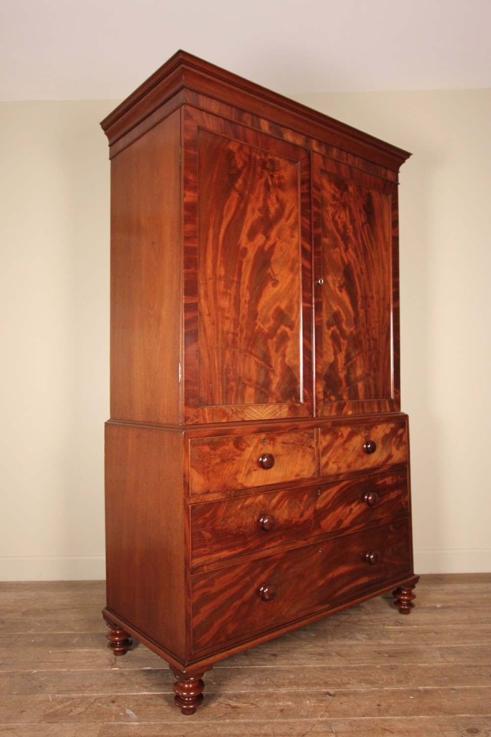 Highly figured William IV Mahogany Linen Press