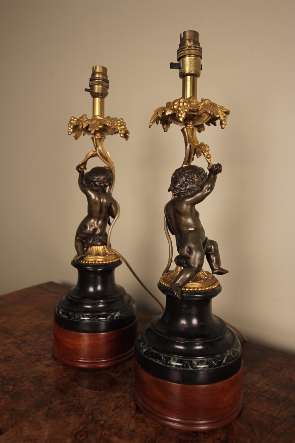 A Pair of Bronze, Ormolu & Marble Cherub Lamps View II