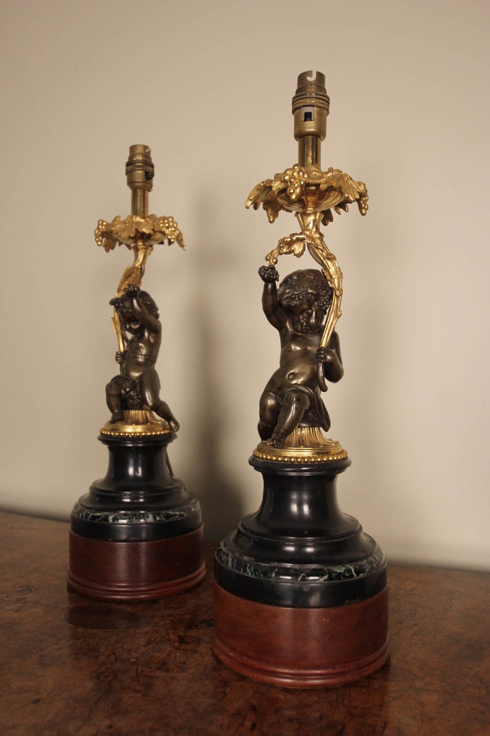 A Pair of Bronze, Ormolu & Marble Cherub Lamps View III