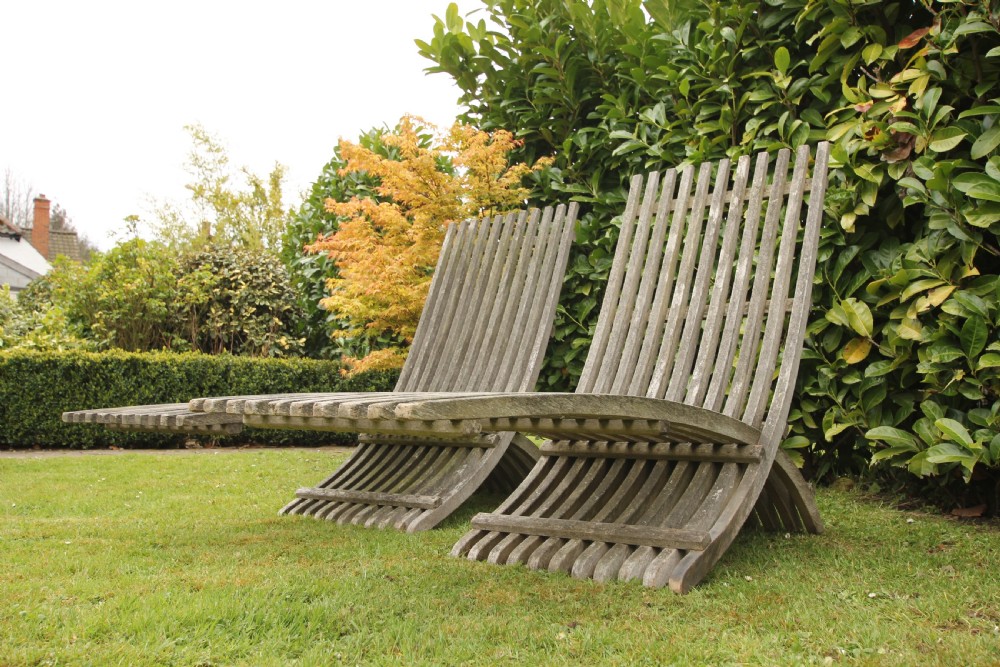 Stylish Pair of 1920's Teak Garden Lounger Chairs