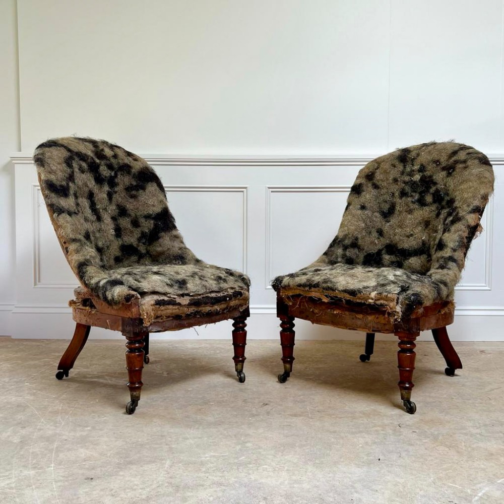 A Pair Of George IV Rosewood Slipper Chairs
