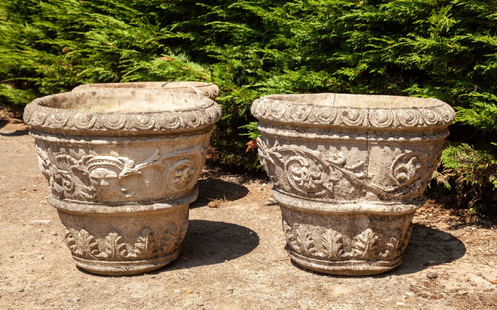Set of three composite stone planters circa 1920