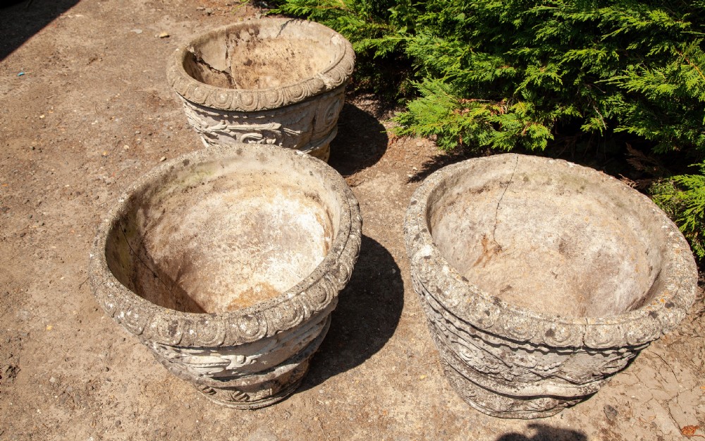 Set of three composite stone planters circa 1920 View II