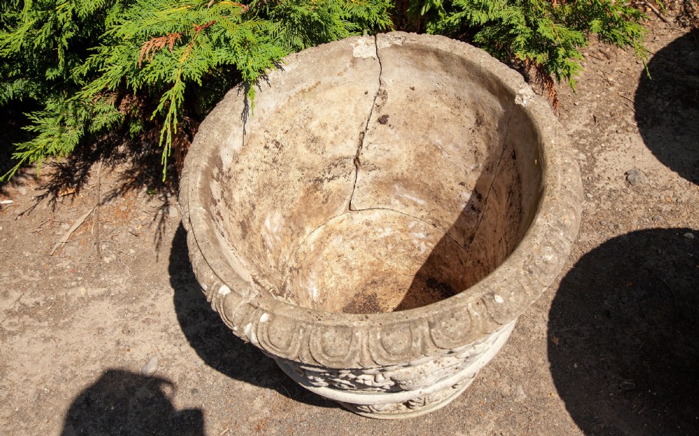 Set of three composite stone planters circa 1920 View III