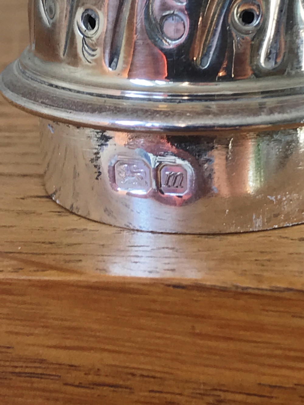 George III style Silver Sugar caster  with London Hallmarks for A .C & sons  Ltd. 1967. View VII