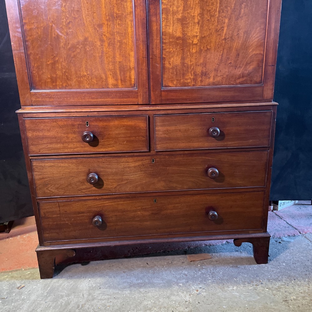 Early 19thc flame Mahogany linen Press c1820 View II