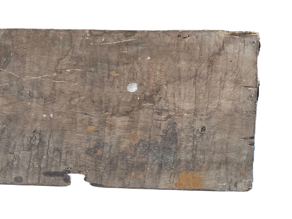 A rectangular, weathered wooden shop sign with hand-painted white lettering reading PAPETERIE against a dark brown painted surface. View VI