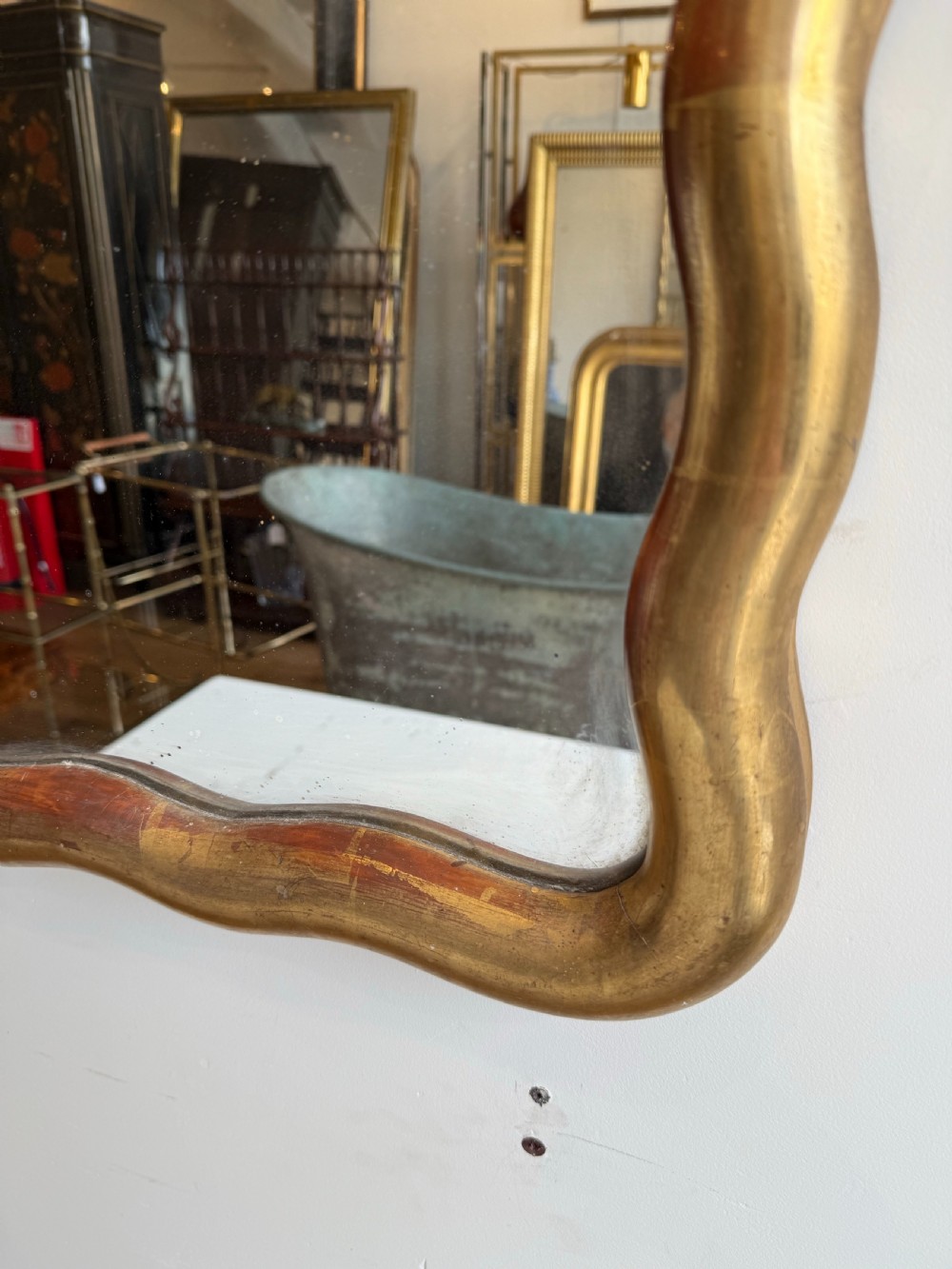French wavy edge gilt mirror View V
