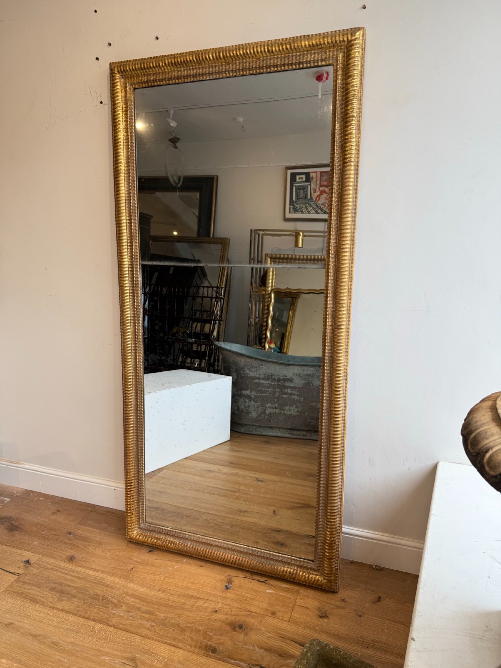 Massive French antique ripple frame gilt mirror View II