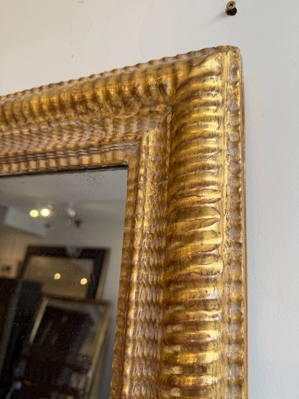 Massive French antique ripple frame gilt mirror View III