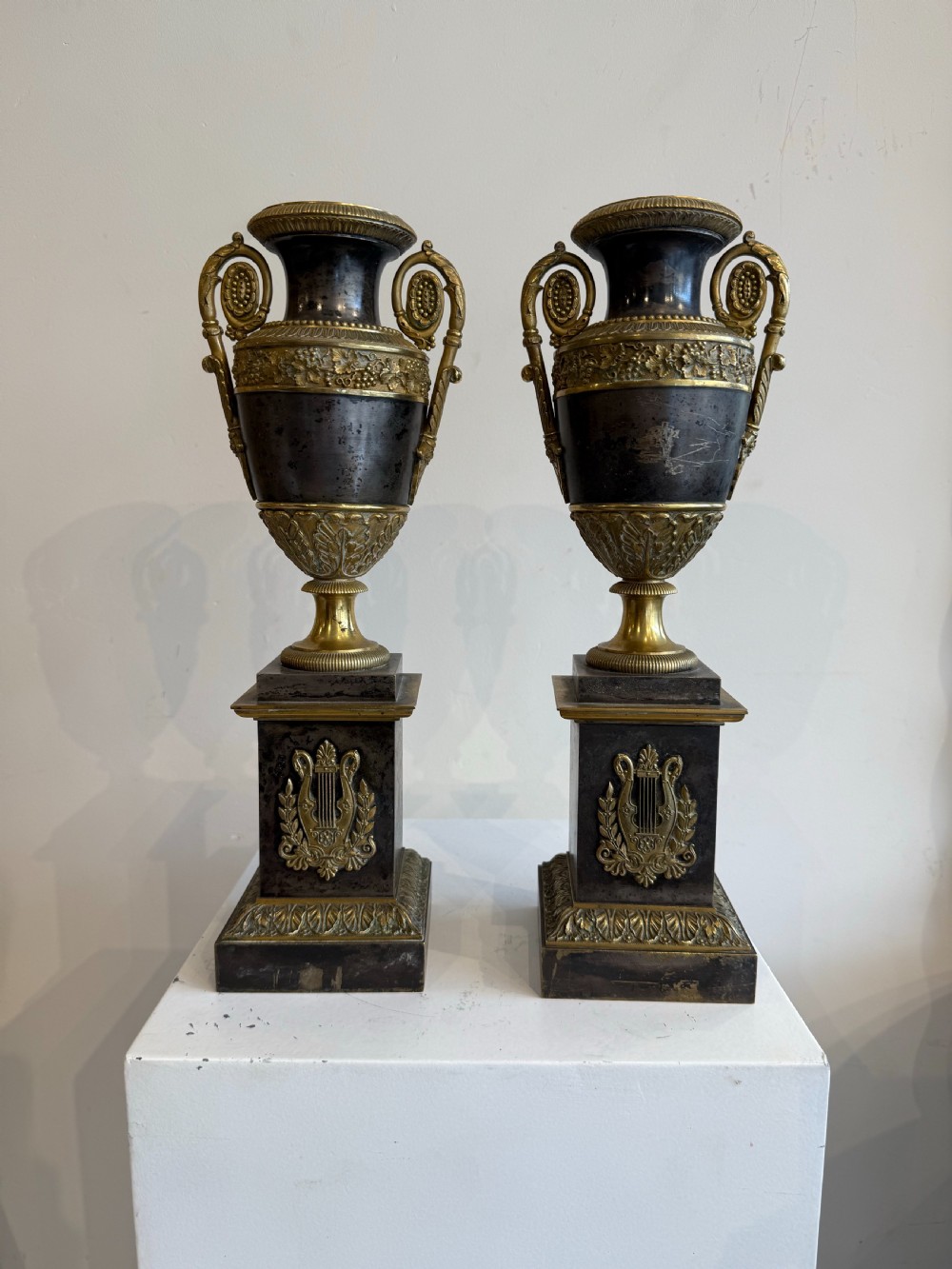Empire polished steel and ormolu cassoulets 