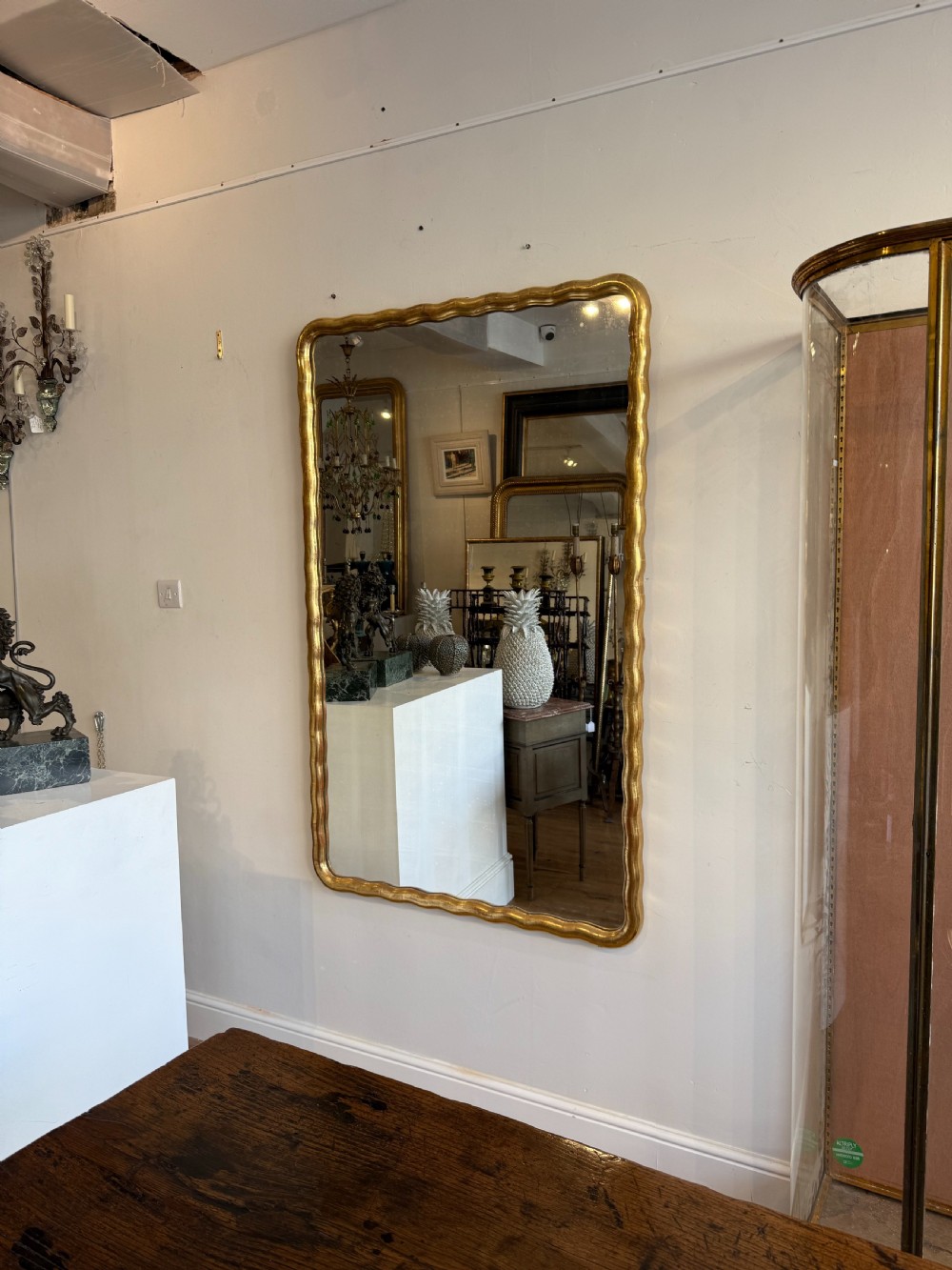 Large French wavy edge gilt mirror