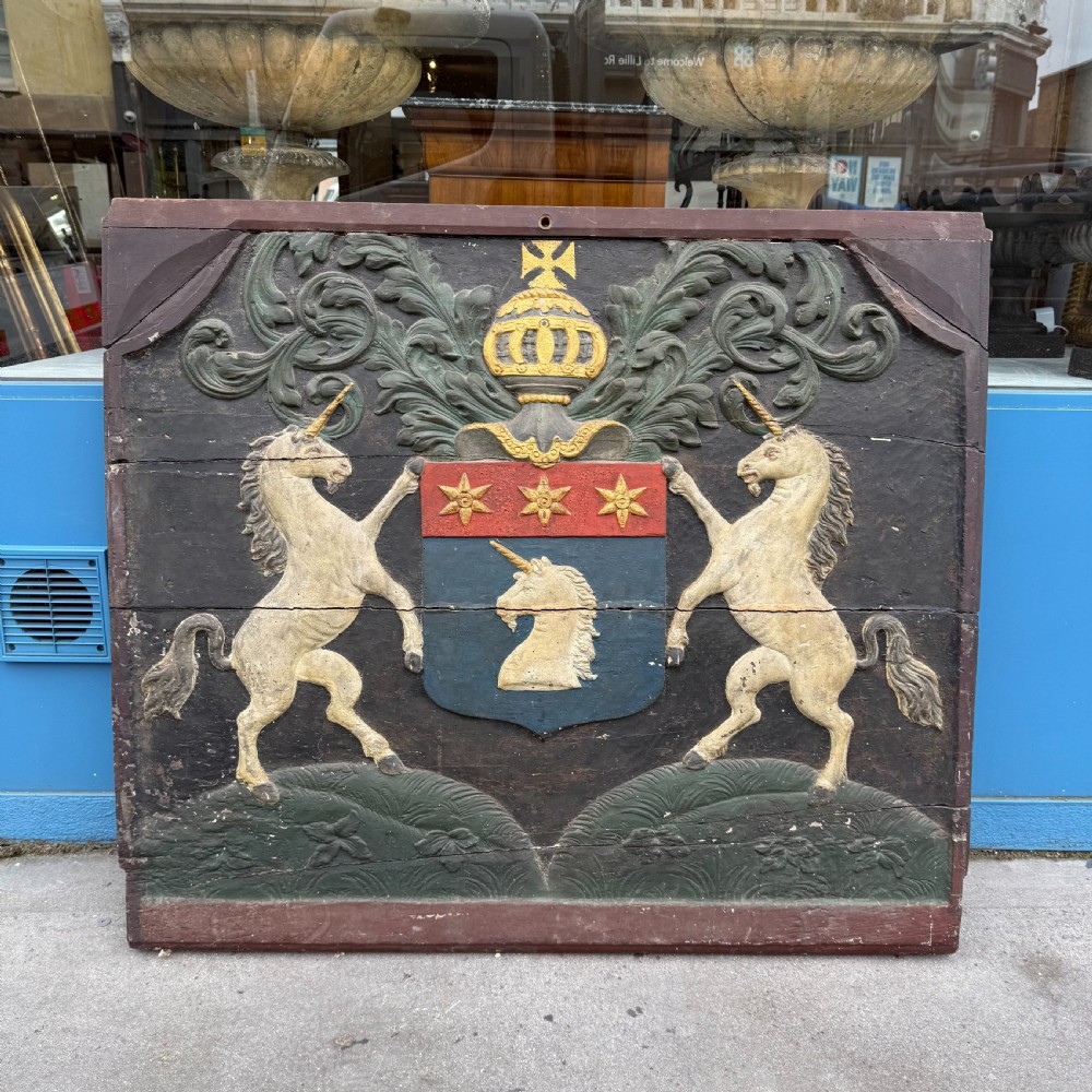 Carved coat of arms depicting unicorns