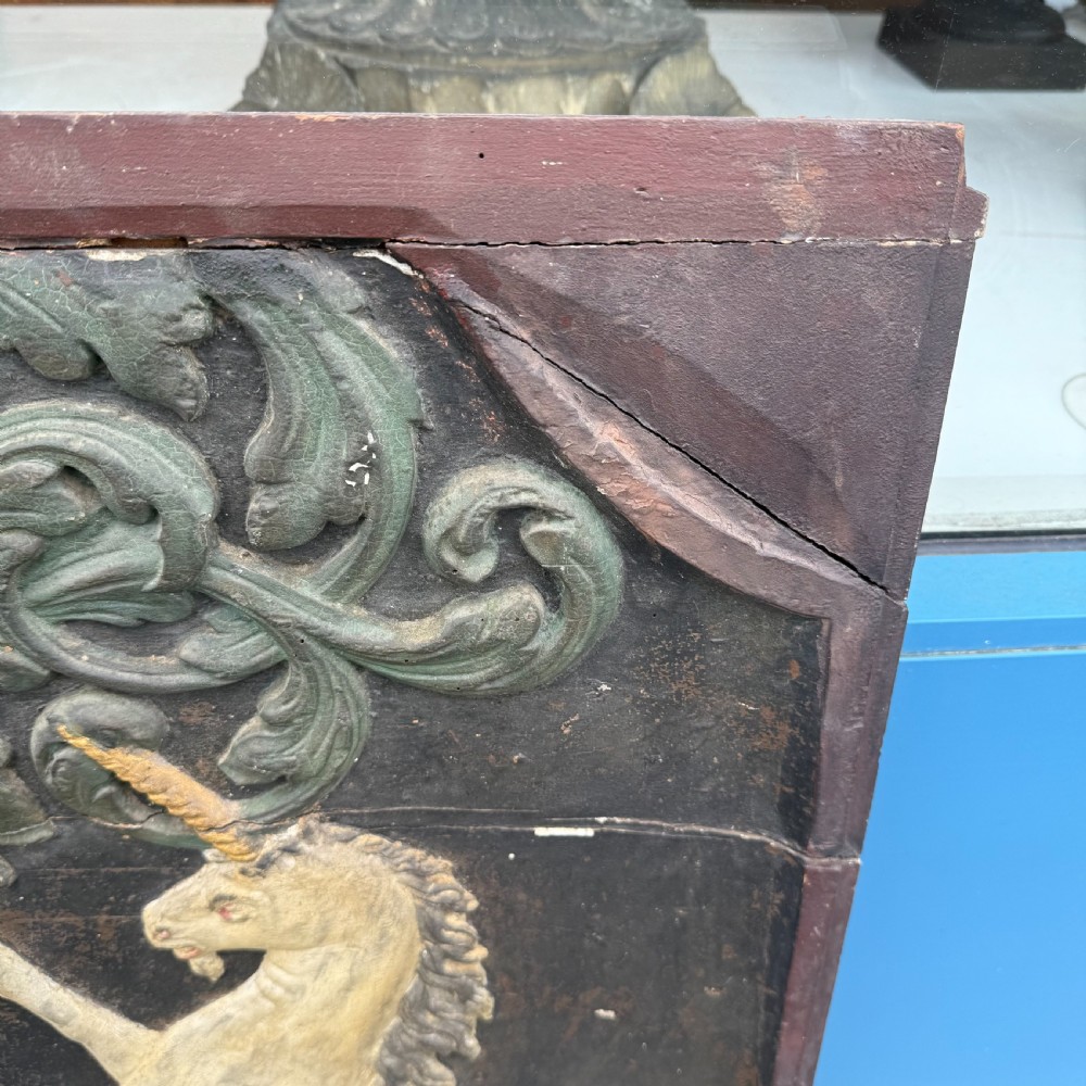 Carved coat of arms depicting unicorns View VIII