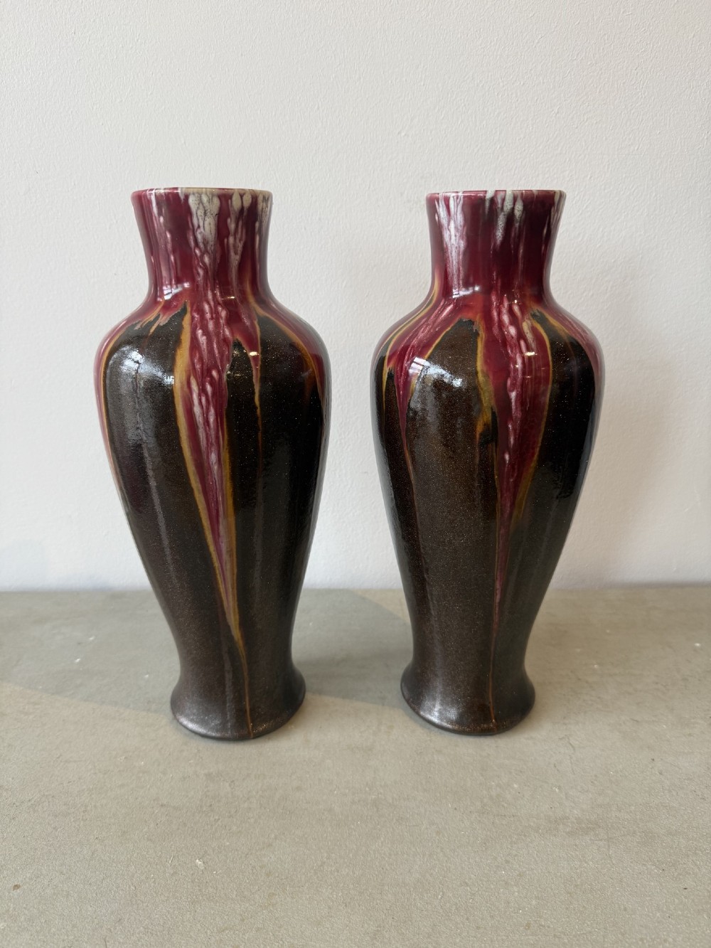 Pair of French red drip glaze pottery vases