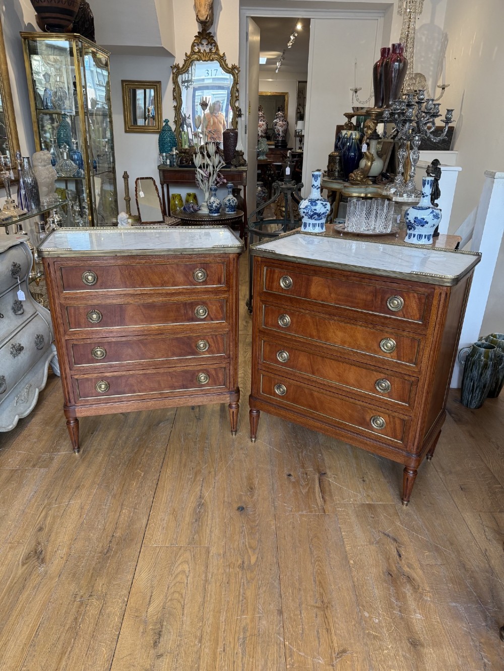 Pair of Louis XVI style mahogany commodes of small proportions