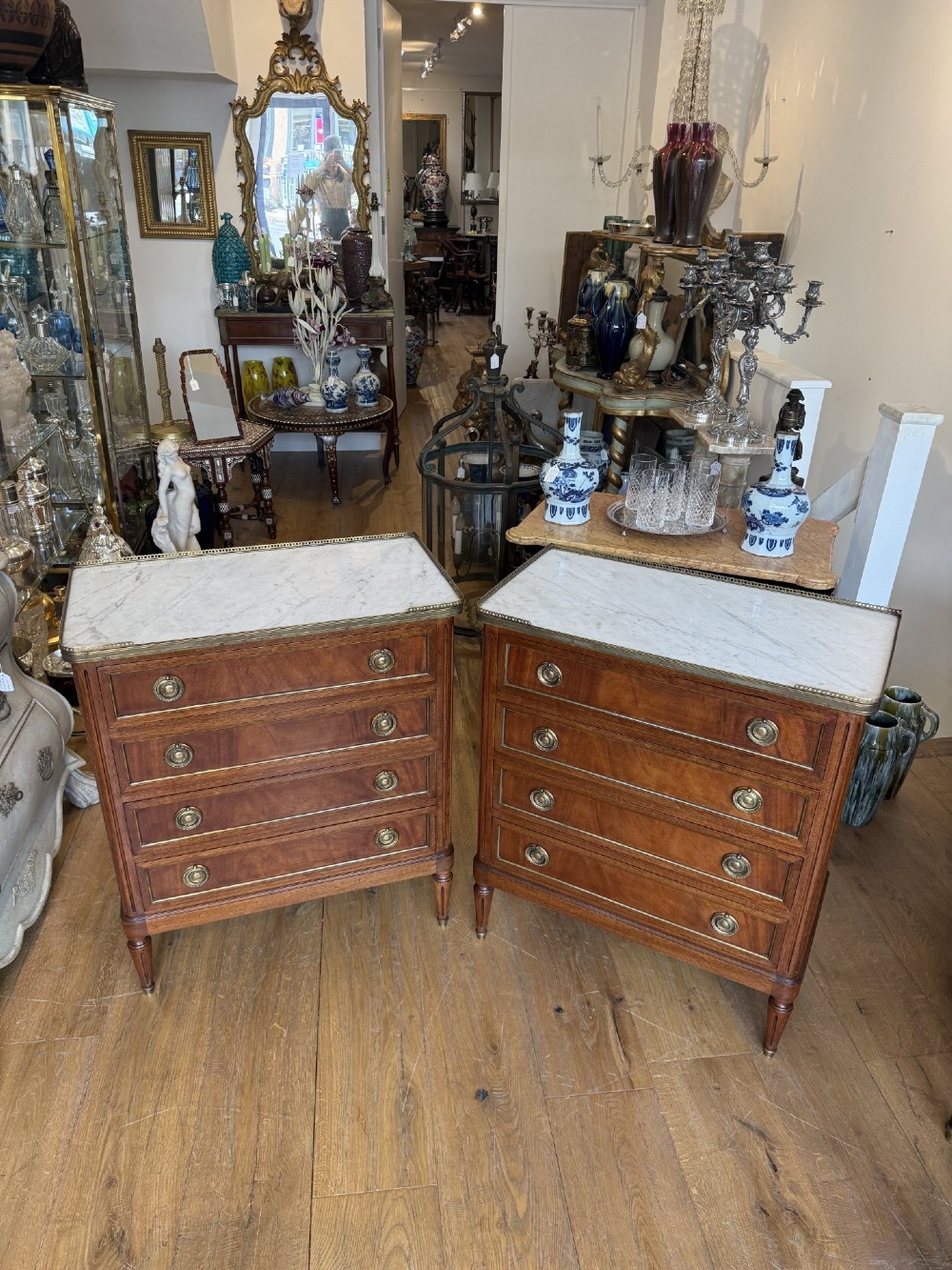 Pair of Louis XVI style mahogany commodes of small proportions View II