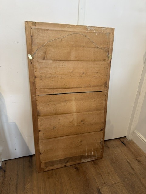 A large rectangular 19th-century wall mirror featuring a textured gold ripple-moulded frame. View VI