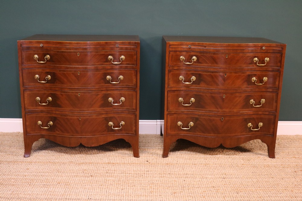 A Pair of George III Revival Serpentine Chest of Drawers View III
