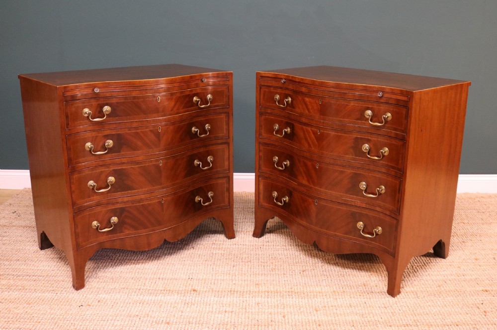 A Pair of George III Revival Serpentine Chest of Drawers View IV