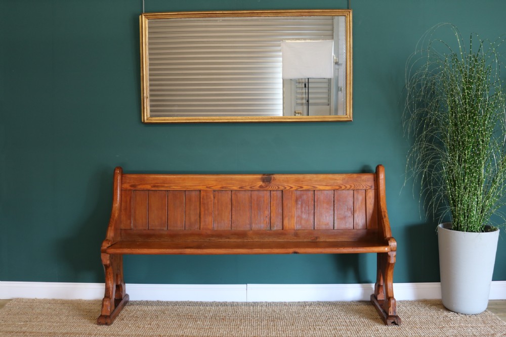 A Gothic Revival-style pine pew View V