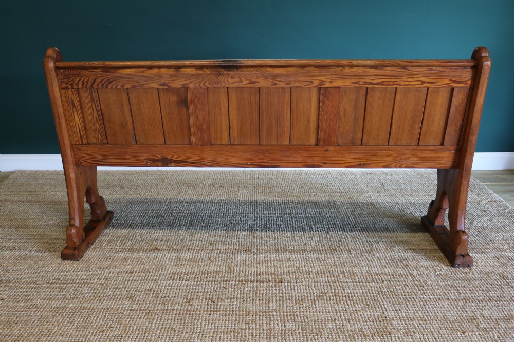 A Gothic Revival-style pine pew View III