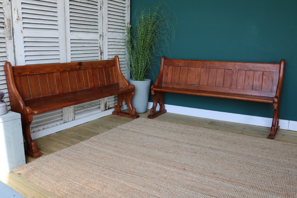 A pair of pine pews, in Reformed Gothic taste