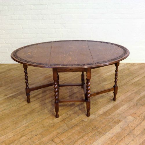 oak gateleg table with carved top - CATEGORY: ANTIQUE TABLES - DATED 1920