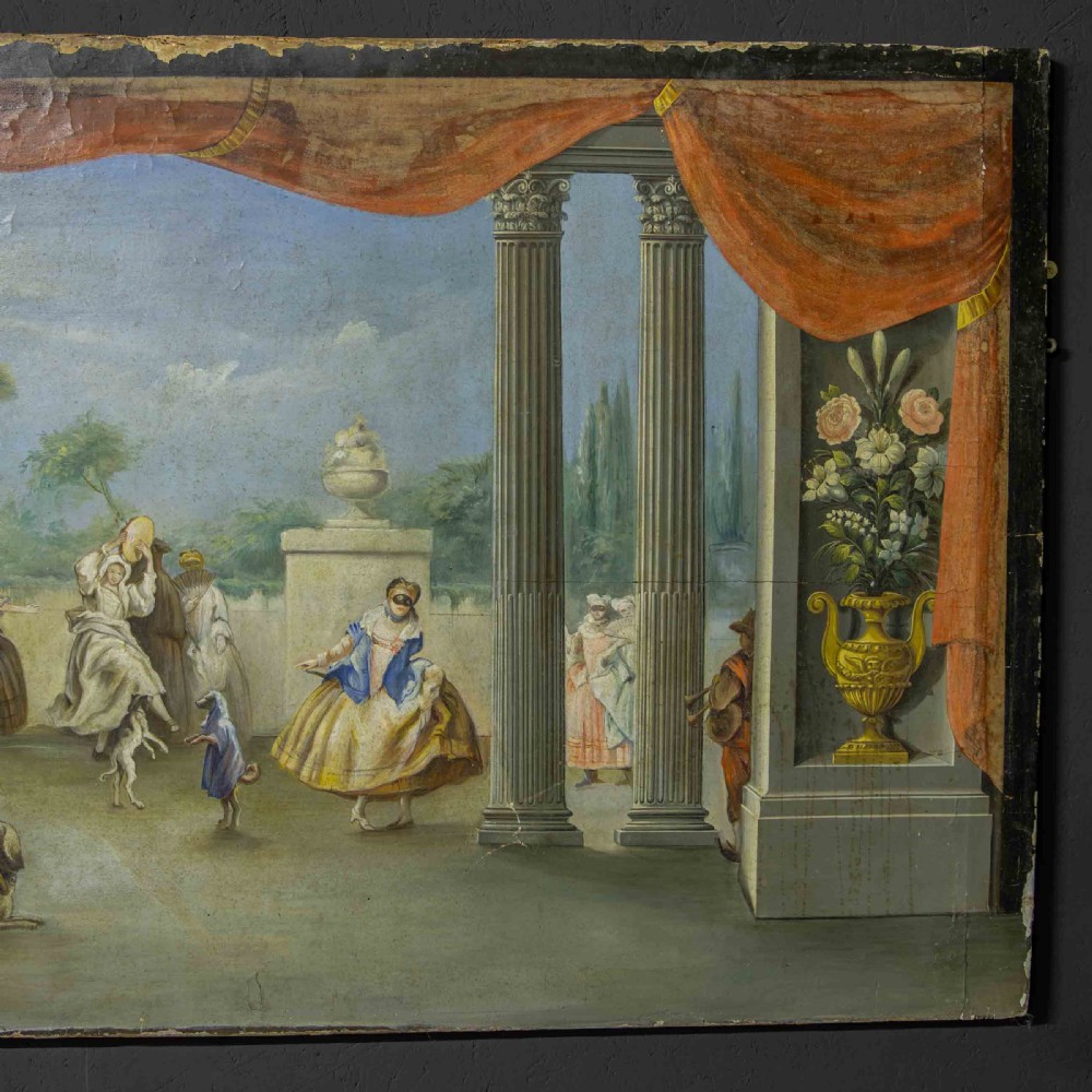 A horizontal late Victorian oil painting depicting a theatrical stage with classical fluted columns, draped terracotta curtains, and costumed figures in an outdoor courtyard. View VI