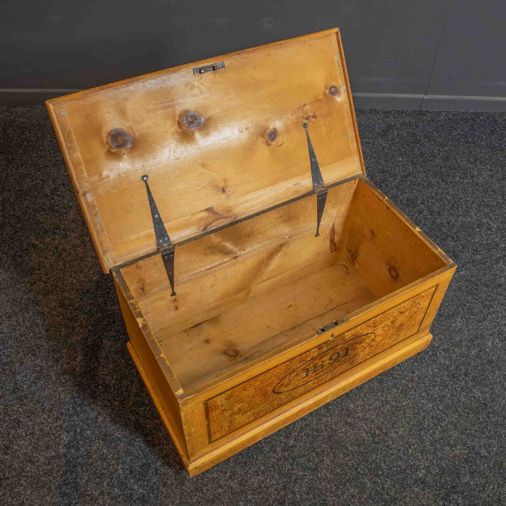 A Victorian pine storage box with a yellow-brown scrumbled painted finish, featuring the word HOPE on the lid and the year 1891 within an oval frame on the front. View V