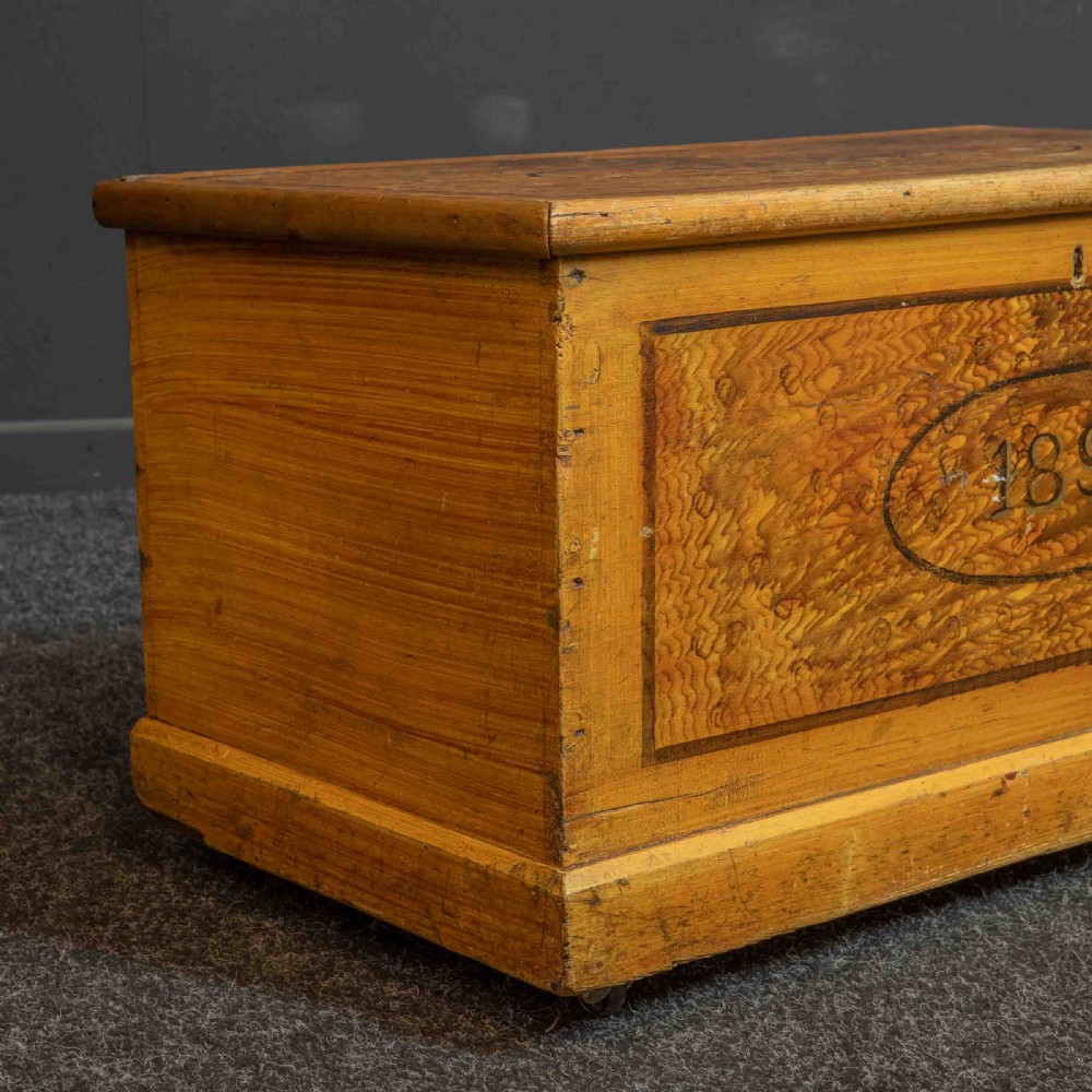 A Victorian pine storage box with a yellow-brown scrumbled painted finish, featuring the word HOPE on the lid and the year 1891 within an oval frame on the front. View VII