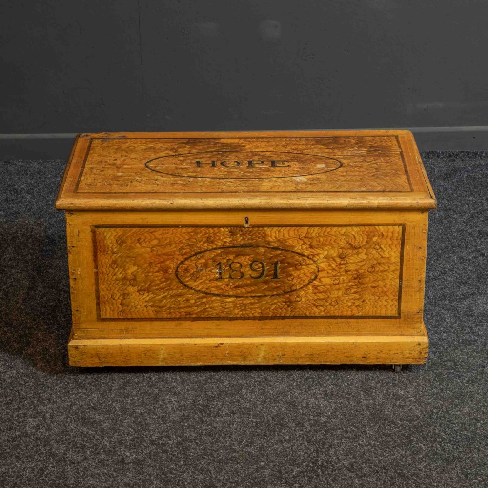 A Victorian pine storage box with a yellow-brown scrumbled painted finish, featuring the word HOPE on the lid and the year 1891 within an oval frame on the front. View VIII