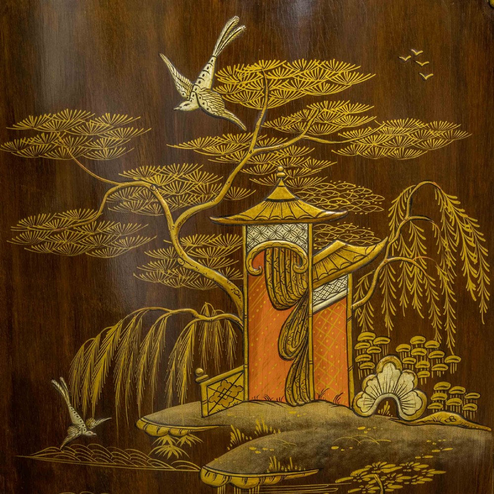 An antique dark timber Chinoiserie display cabinet featuring gold lacquered oriental scenes, glazed side panels, and carved cabriole legs with ball and claw feet. View XII