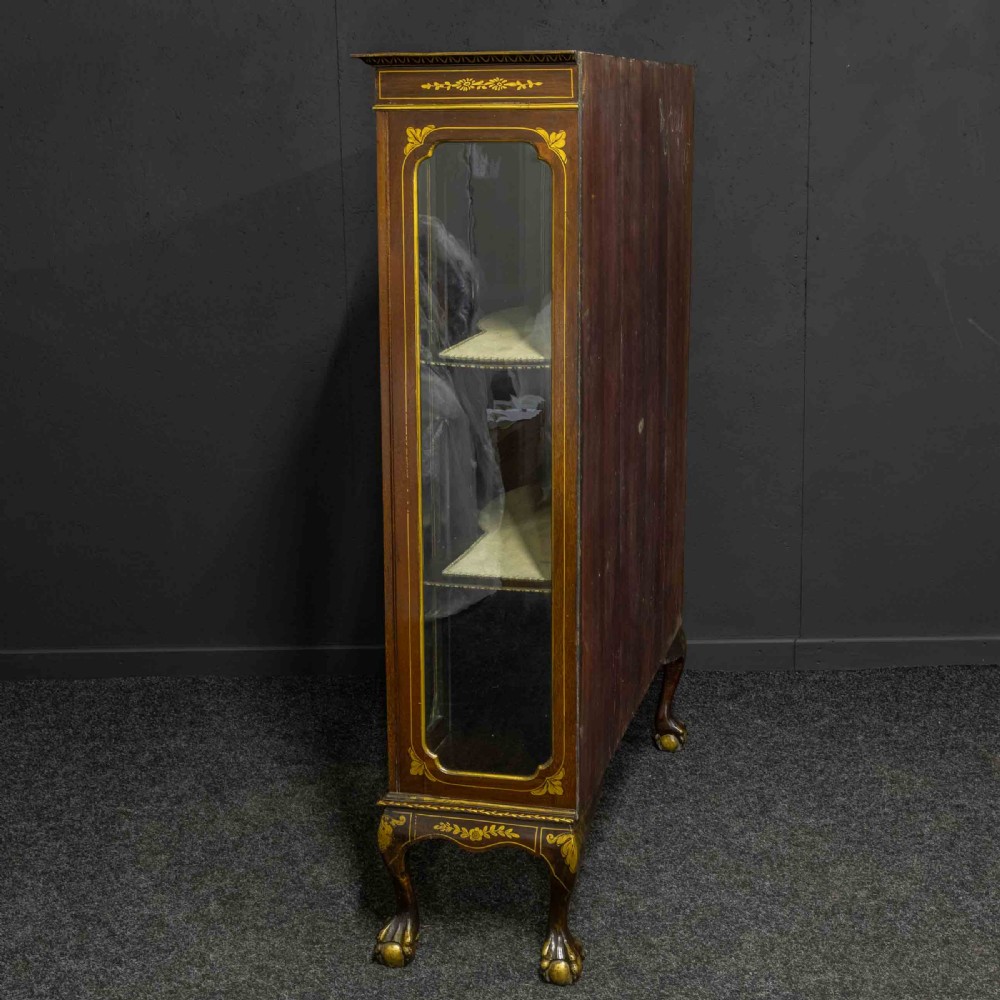 An antique dark timber Chinoiserie display cabinet featuring gold lacquered oriental scenes, glazed side panels, and carved cabriole legs with ball and claw feet. View XVIII