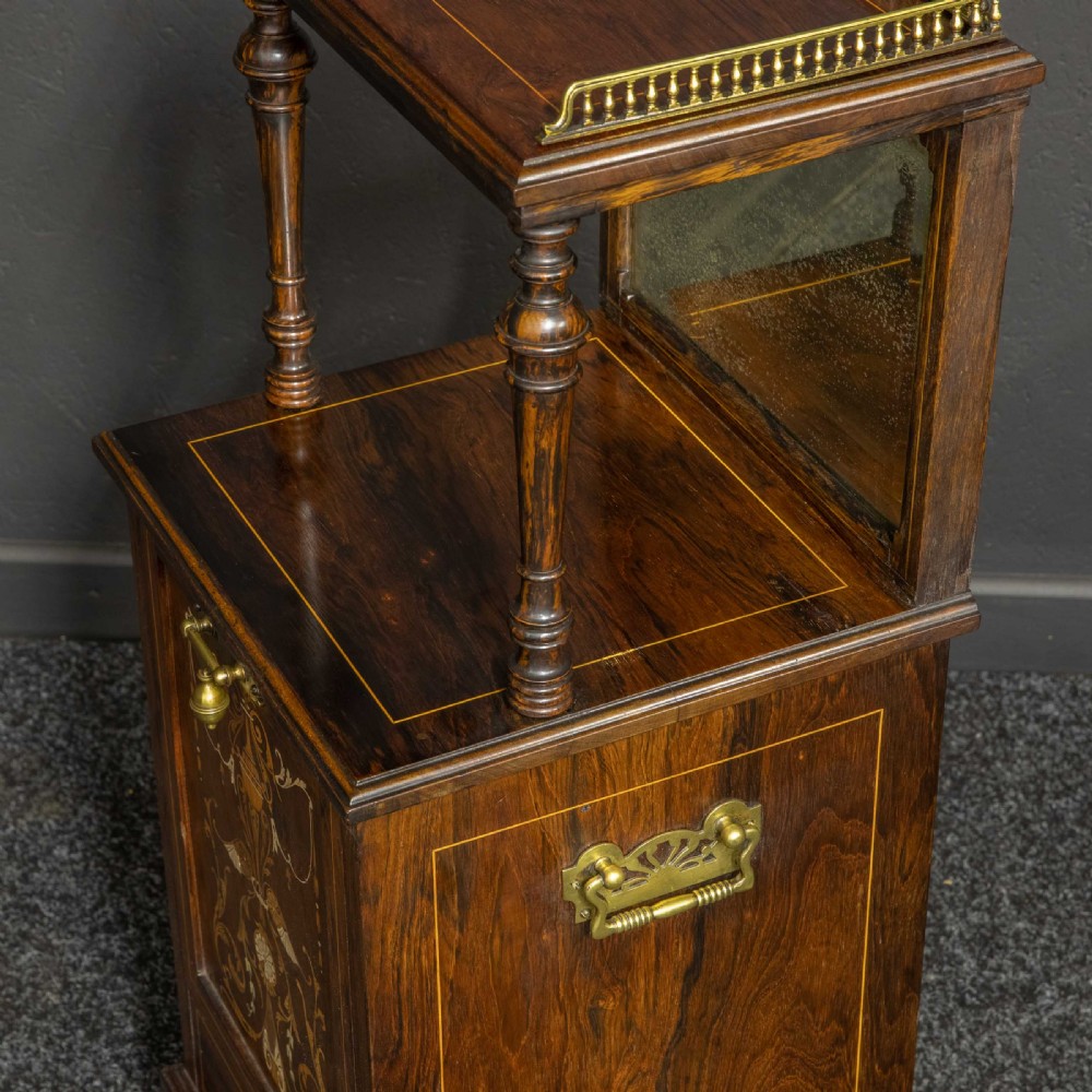 A pair of Edwardian inlaid rosewood bedside cabinets featuring brass gallery tops, mirrored upper shelves with turned pillars, and floral marquetry doors. View III