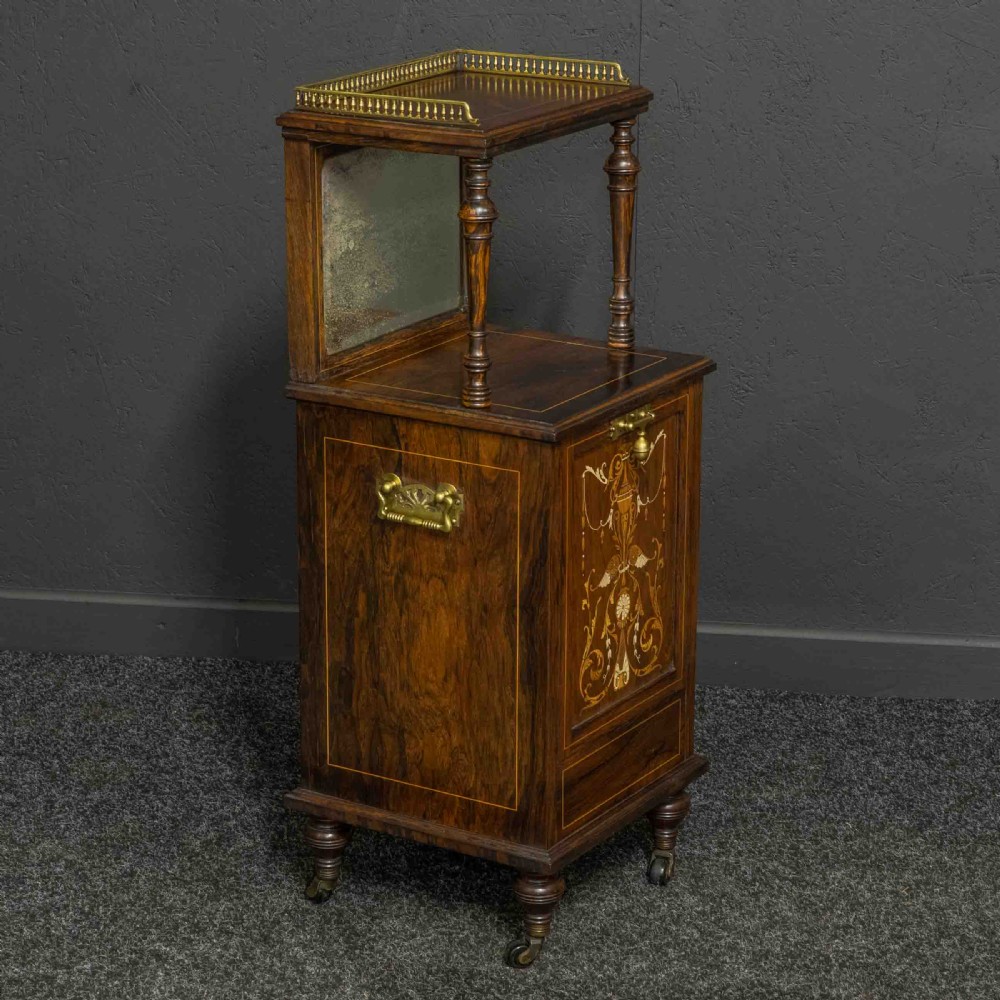 A pair of Edwardian inlaid rosewood bedside cabinets featuring brass gallery tops, mirrored upper shelves with turned pillars, and floral marquetry doors. View IV