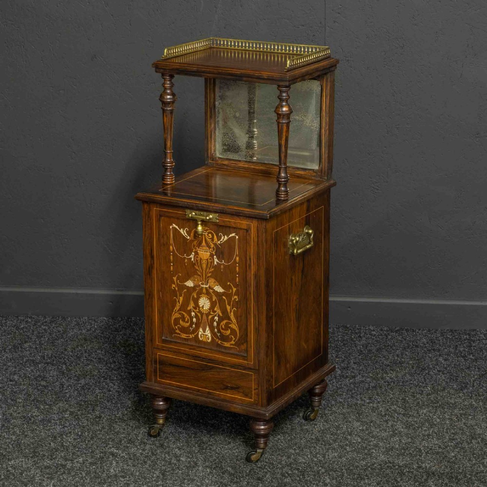 A pair of Edwardian inlaid rosewood bedside cabinets featuring brass gallery tops, mirrored upper shelves with turned pillars, and floral marquetry doors. View VI