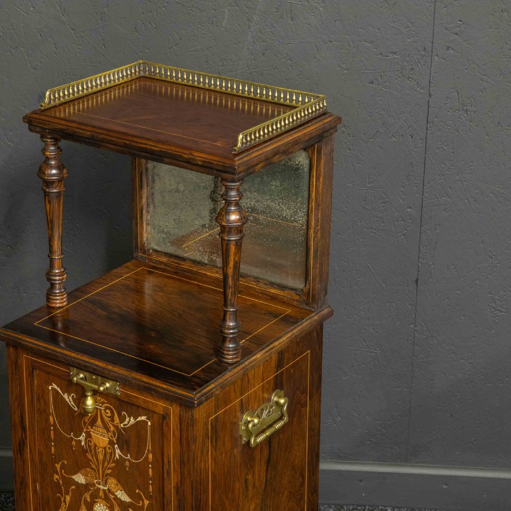 A pair of Edwardian inlaid rosewood bedside cabinets featuring brass gallery tops, mirrored upper shelves with turned pillars, and floral marquetry doors. View VIII