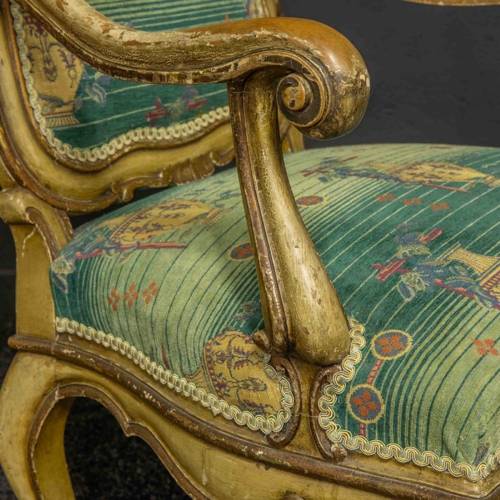A 19th-century French giltwood fauteuil open armchair featuring carved shell motifs, cabriole legs, and patterned green upholstery. View III