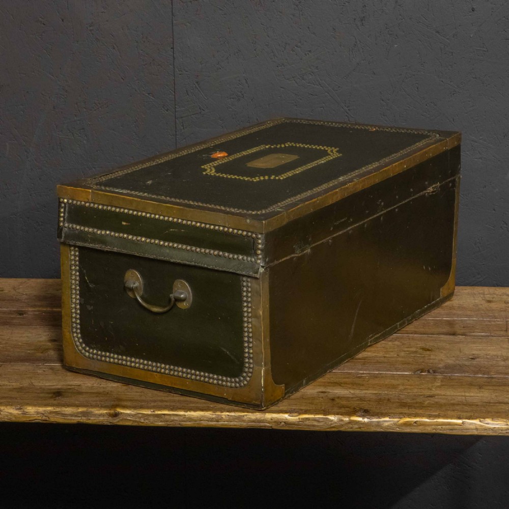 An early nineteenth-century dark green leather coaching trunk featuring brass stud embellishments in a festoon pattern and side carrying handles. View VII
