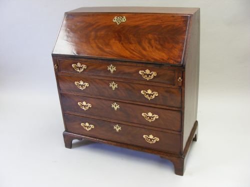 A George III Flame Mahogany Bureau.