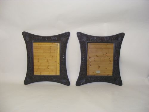 A Very Decorative Pair of Anglo Indian Ebony Carved Wall Mirrors