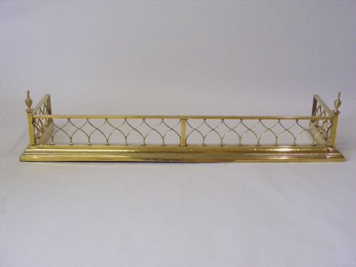 An Elegant 19th Century Brass Fender.