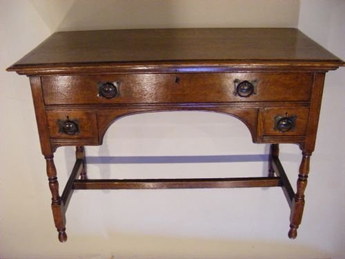 An Arts and Crafts Writing/side Table.