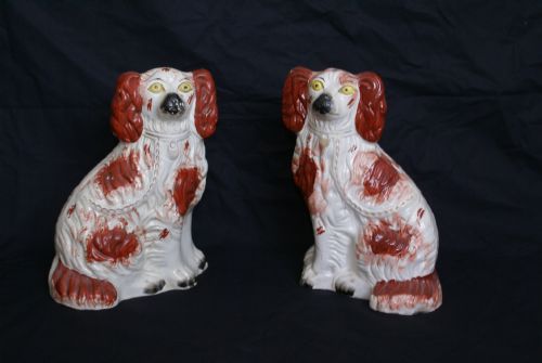 A Pair of Late 19th Century Staffordshire Pottery Spaniels.